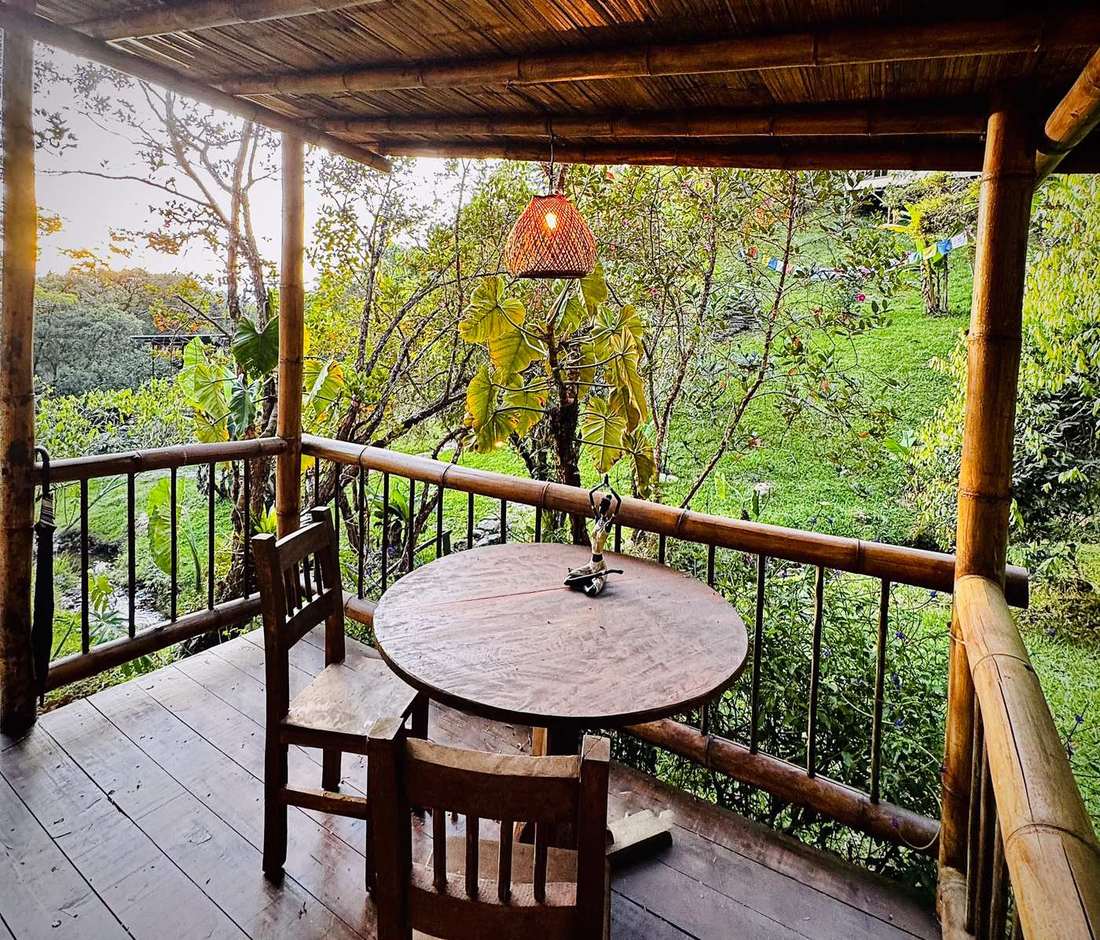 Creekside Cabin private balcony overlooking the creek